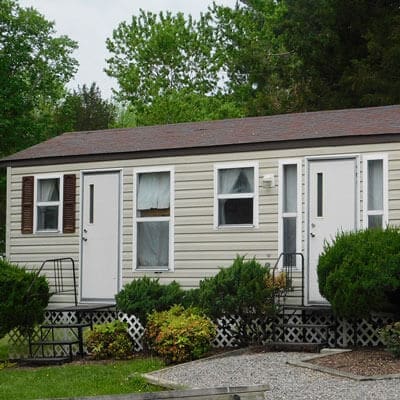 Wilderness Presidential Resort RV 28' Cobra Camp Cottage Park Model RV