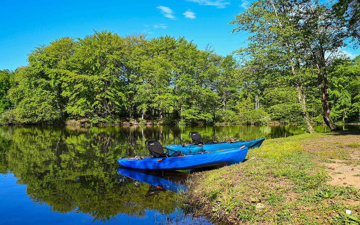 kayak fishing right out back door of lakeside camp cottage