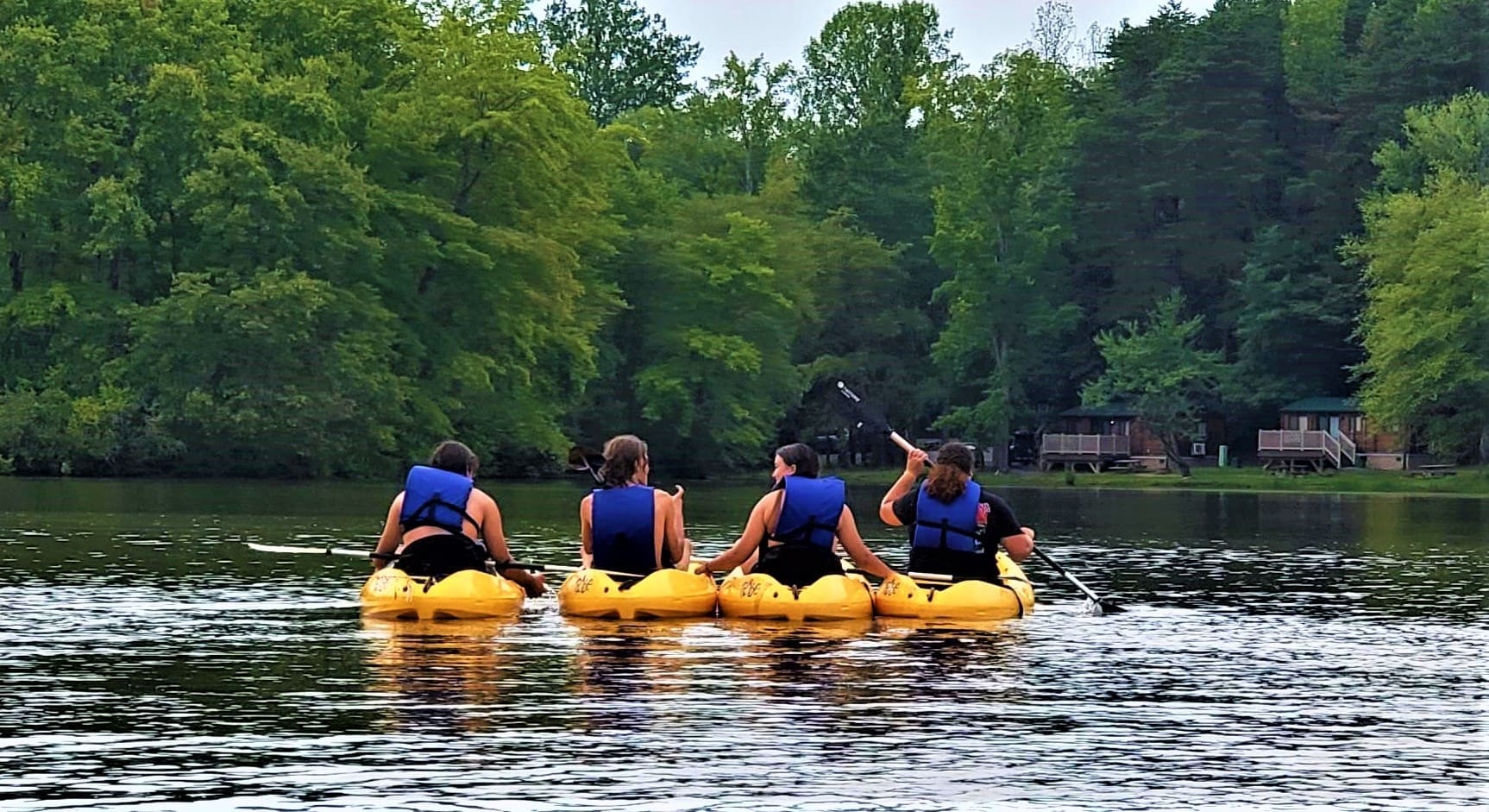 Girlfriends Getaways Fun on Kayaks. Kayak Races