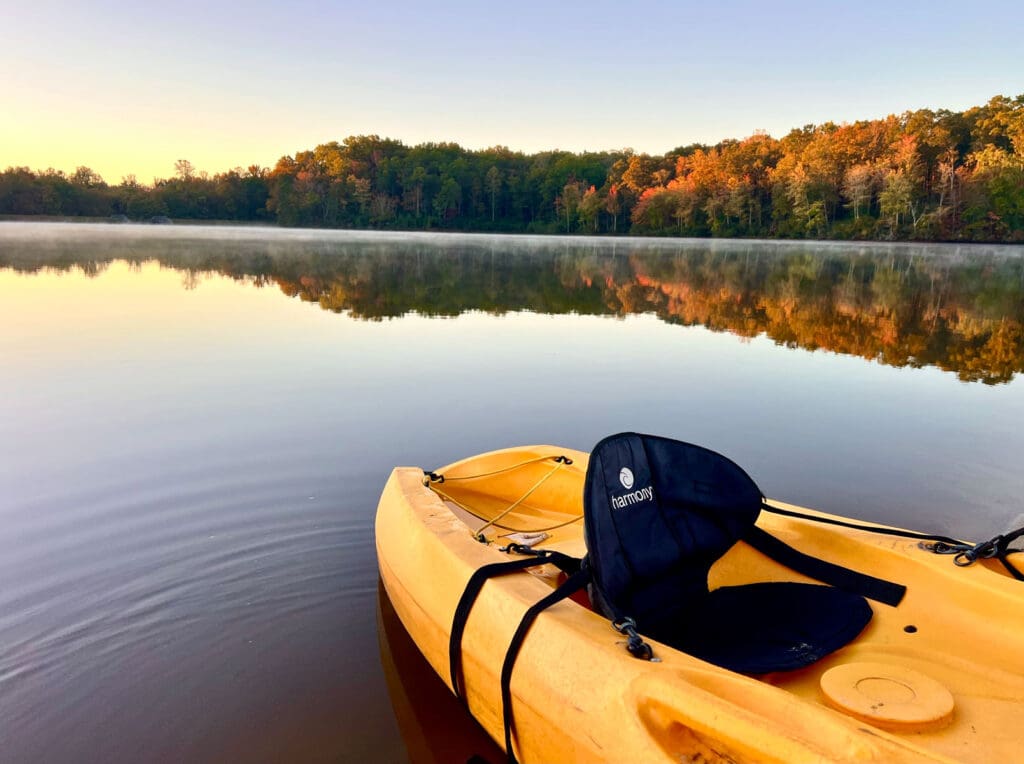Kayak on cool Spring Lake during sunrise