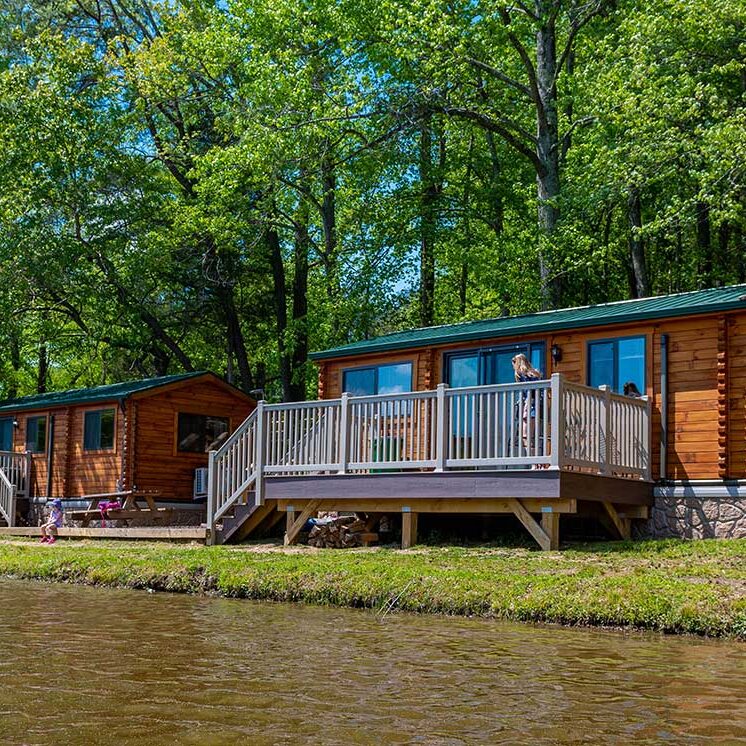Waterfront literally 6 feet from deck of lakeside camp cottages